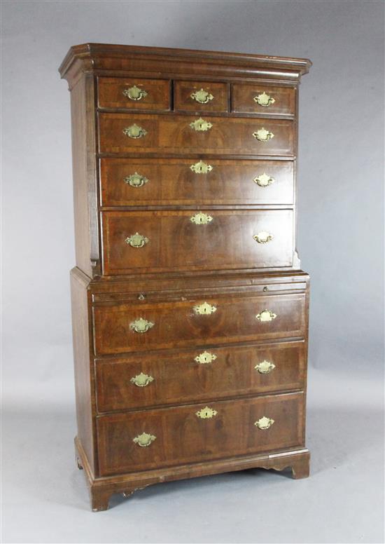 A George II walnut chest on chest, W.3ft 5in. D.1ft 10in. H.6ft 5in.
